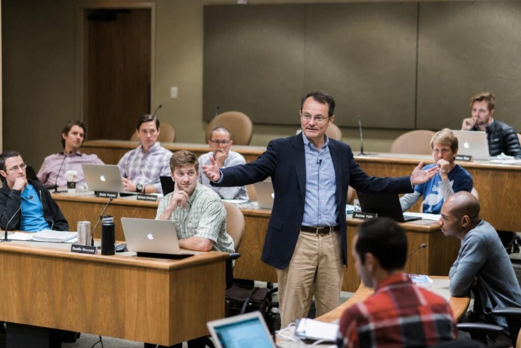 An instructor questions participants during a Socratic case discussion